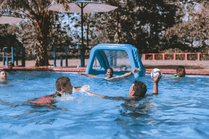 people-on-swimming-pool-playing-ball